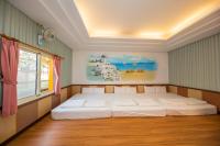 Camera Familiare con Vista Giardino