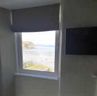 Suite mit Kingsize-Bett und Meerblick