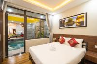 DELUXE DOUBLE ROOM WITH BALCONY AND POOL VIEW