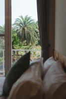 Vierpersoonskamer met een Balkon en Uitzicht op de Bergen