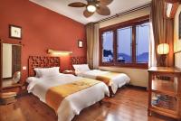 Zweibettzimmer mit Dorfblick