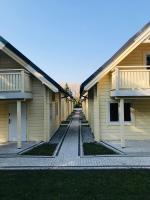 Domki letniskowe Azalia - Ferienwohnung Henkenhagen