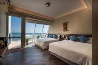 Vierpersoonskamer met Uitzicht op Zee