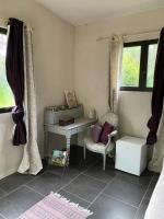 Camera Familiare con Vista Giardino