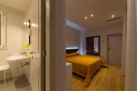 Tweepersoonskamer met 2 Aparte Bedden en een Terras