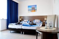 Tweepersoonskamer met 2 Aparte Bedden en een Terras