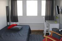 Chambre Simple avec Toilettes et Douche Communes