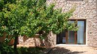Bella casa con giardino a 10 minuti dal mare - B&B Aglientu