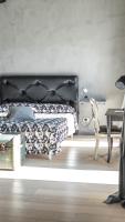 Kamer met Queensize Bed en Uitzicht op de Tuin