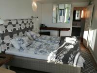 Doppel- oder Zweibettzimmer