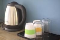 Kamer met Queensize Bed en Eigen Externe Badkamer 