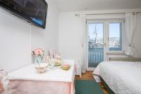 Camera Tripla con Vista Lago