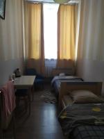 Camera Doppia con Letti Singoli e Bagno in Comune