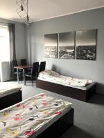 Chambre Quadruple avec Salle de Bains Commune