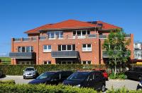 Haus Leuchtturm - Ferienwohnung Bensersiel