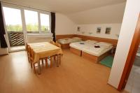 Dreibettzimmer mit Balkon