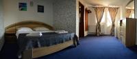 Kamer met Queensize Bed en Balkon