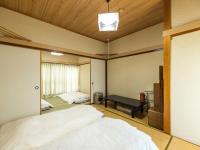 Camera Quadrupla in Stile Giapponese con Bagno in Comune - Fumatori