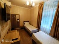 Camera Doppia con Letti Singoli con Bagno Privato 