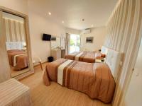 Camera Matrimoniale con Letto Supplementare