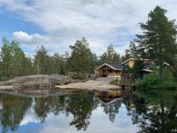 Luxury Holiday Home with Private Lake - B&B Vehmaa