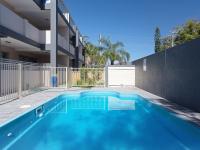 Shoal Bay Beach Apartments, 9 2 Shoal Bay Road, air conditioning, complex swimming pool and lift - B&B