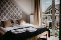 Orbisa Bis w cenie Basen podgrzewany Sauna Jacuzzi Rowery Parking Klimatyzacja Opcja śniadań - Chambres d'hôtes Łeba