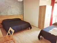 Camera Tripla con Balcone