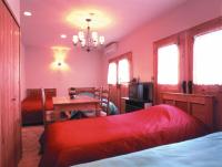 Camera Quadrupla con Bagno in Comune - Non Fumatori