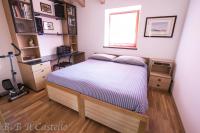 Deluxe Tweepersoonskamer met 1 Tweepersoonsbed of 2 Aparte Bedden en Gedeelde Badkamer