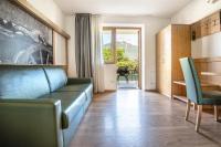 Camera Quadrupla con Vista Giardino 