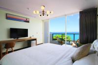 Habitación Doble Deluxe con balcón y vistas al mar