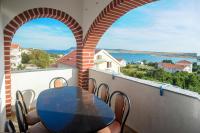 Maisonnette Appartement met 2 Slaapkamers, een Balkon en Uitzicht op Zee