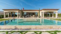 Deluxe Villa mit 4 Schlafzimmern und eigenem Pool.