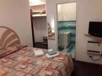 Chambre Quadruple avec Salle de Bains Privative