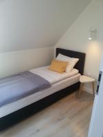 Apartamenty Nadmorska Osada - Chambres d’hôtes Łeba