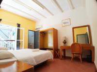 Deluxe Zimmer mit Kingsize-Bett und Gartenblick