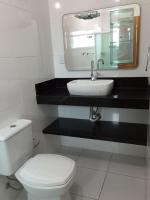 Apartamento com ar condicionado e Wi-fi, frente mar - 02 dormitórios - Edifício Luz do Sol - Chambres d’hôtes Ubatuba