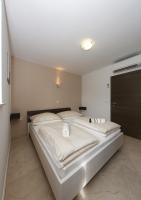 One-Bedroom Apartment with Balcony and Garden View