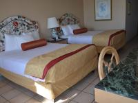 Queen Room with Two Queen Beds and Beach View - Non-Smoking