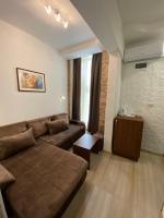 Standard Zimmer mit 2 Einzelbetten und Sofa