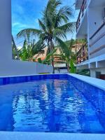 Pousada Primeira Praia Suítes - Bed and Breakfast