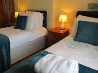 Tweepersoonskamer met 2 Aparte Bedden