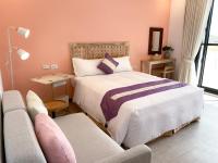 Chambre Double Deluxe - Vue Latérale sur Mer