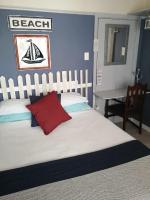 Zimmer mit Queensize-Bett und Gartenblick