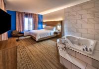 Suite mit Kingsize-Bett mit Whirlpool