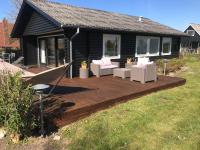 Dejlig sommerhus 150m fra privat strand - Ferienwohnung