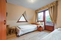 Dreibettzimmer mit Bergblick