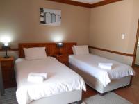 Tweepersoonskamer met 2 Aparte Bedden