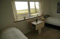 Tweepersoonskamer met 1 of 2 Bedden en Gedeelde Badkamer